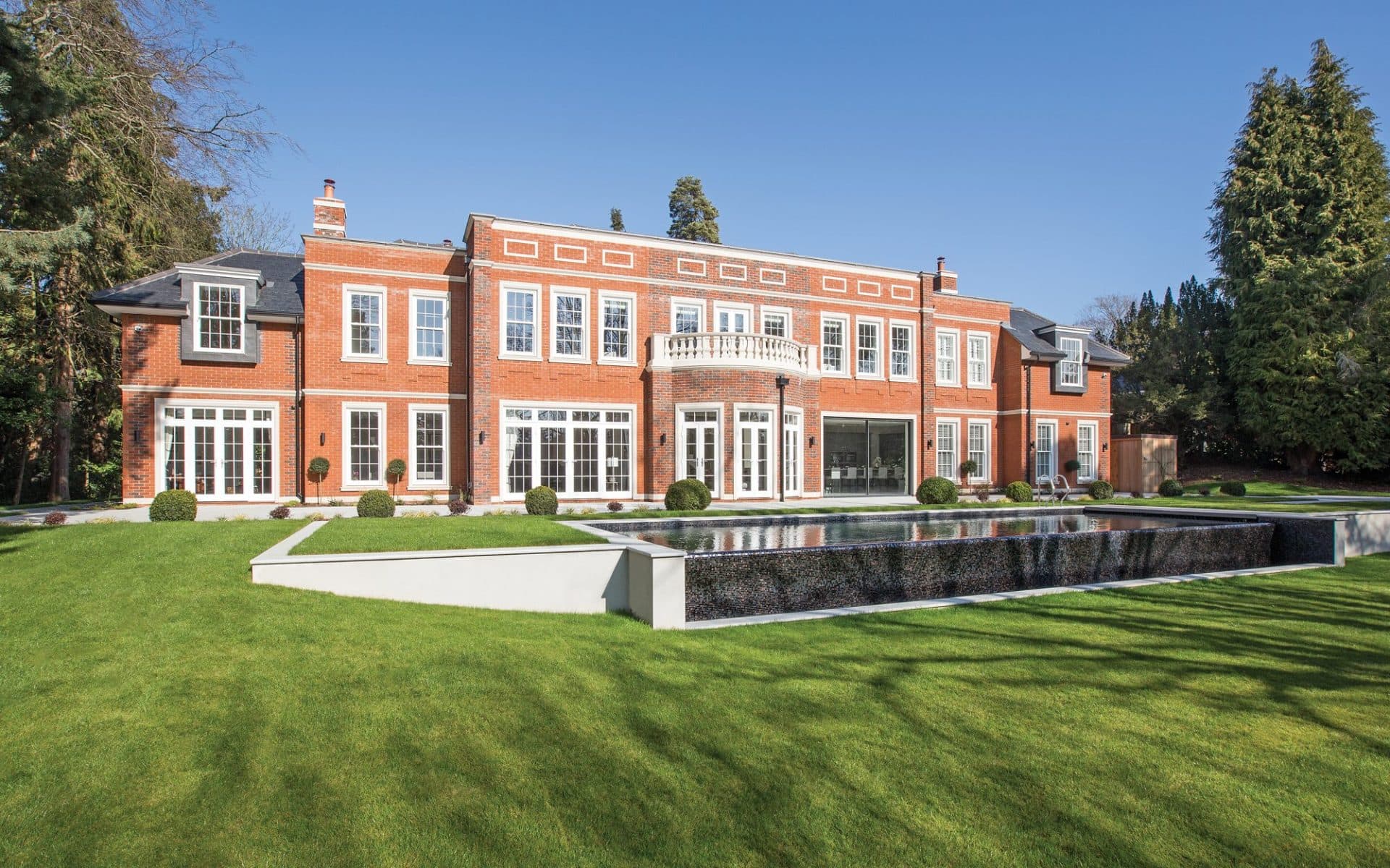 A view from the rear of Aspire private commission, Kings View. The Georgian-style home is backed by an infinity pool and