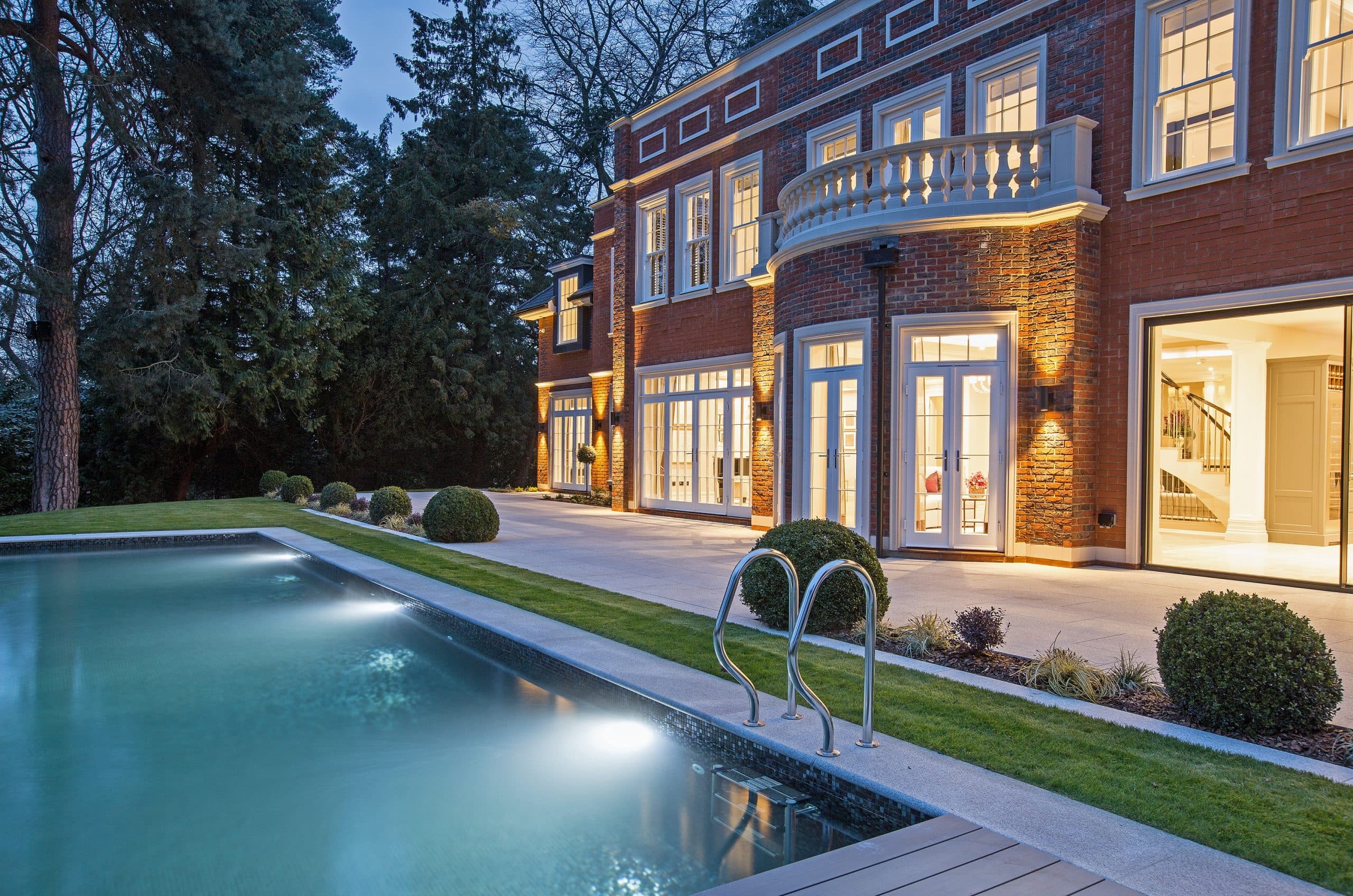 luxury home with outdoor pool