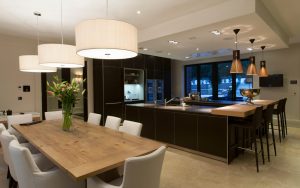 black kitchen with dining space