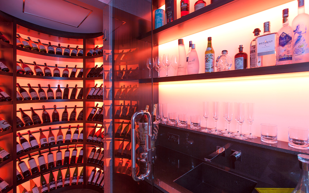 The trendy red-backlit wine store at Dunraven Street, refurbished by Aspire.