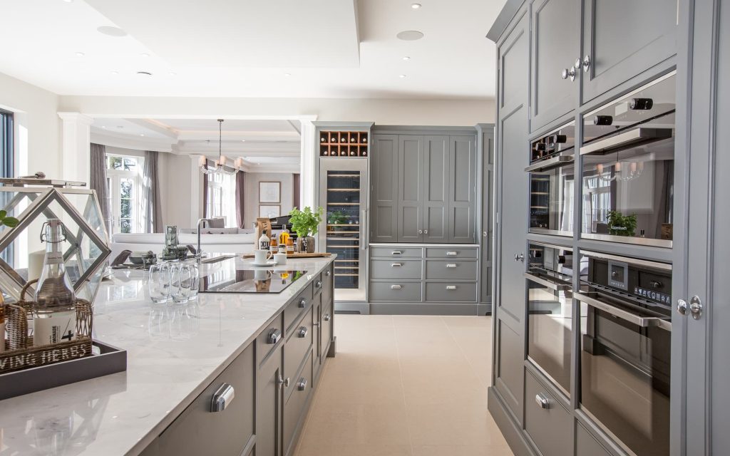 A seamlessly-integrated drinks fridge in the Aspire-designed kitchen at King's View.